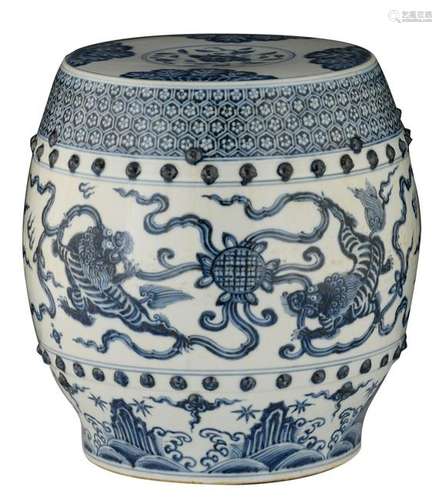 A Chinese blue and white garden seat, decorated with