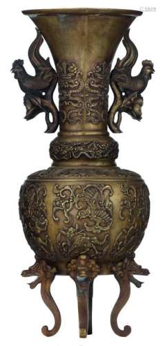 A Chinese archaic bronze vase, relief decorated with