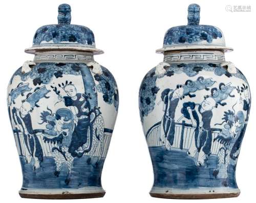 Two Chinese blue and white vases and covers, decorated