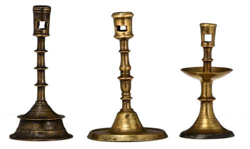 A lot of three various bronze candlesticks, 16th/17thC,