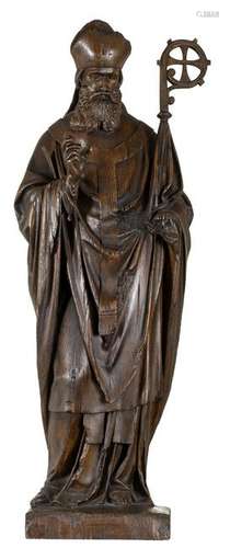 A polychrome wooden sculpture of a blessing bishop,