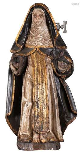 A polychrome oak sculpture depicting Saint Theresia,