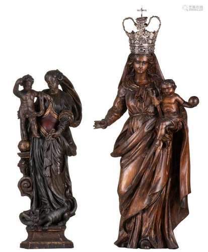 Two polychrome wooden sculptures depicting the Holy