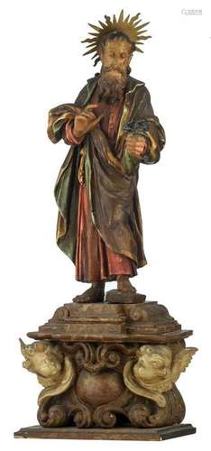 A polychrome painted wooden sculpture depicting Saint