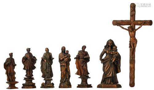 A lot of seven religious wooden sculptures, consisting