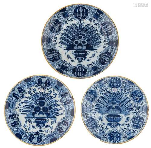 Three blue and white Delftware plates with a so called