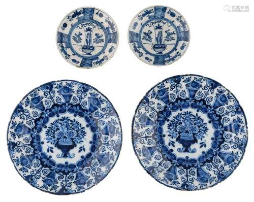 Two large Delftware dishes with a flower basket