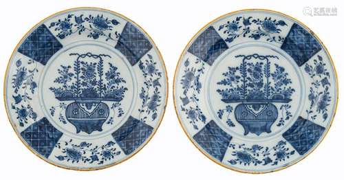 Two Dutch Delftware plates with a flower basket