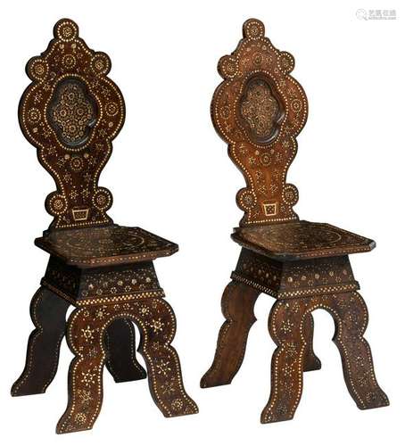 A pair of Renaissance style Italian walnut sgabelli