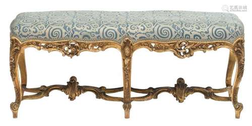 An 18thC richly carved gilt Louis XV banquette, stamped