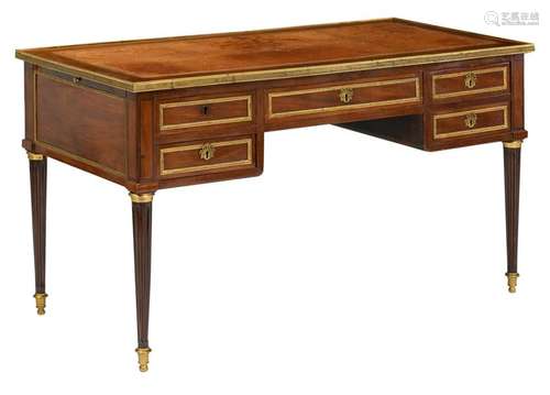 A Louis XVI style mahogany bureau plat, with bronze