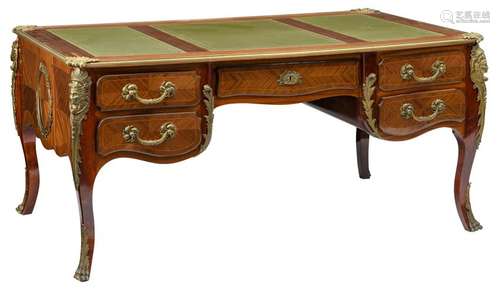 A French Louis XV style mahogany veneered bureau plat,