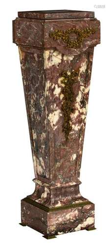 A neoclassical Rouge Royal marble column, floral