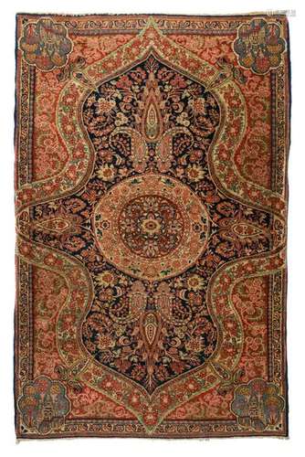 An Oriental woollen prayer rug, decorated with floral