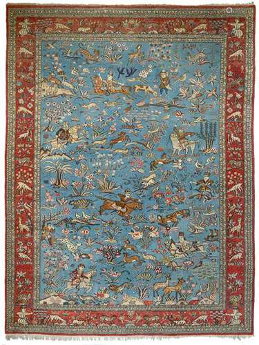 An Oriental woollen rug, decorated with various hunting