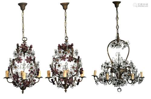 A pair of floral decorated brass chandeliers with