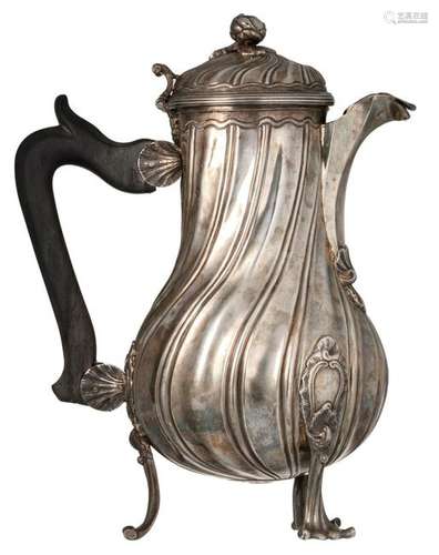 A silver Rococo coffee pot with ebony handle,