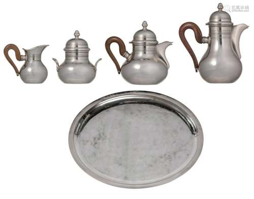 A silver coffee and tea set with wooden handles,