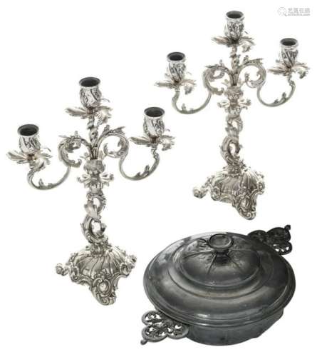 A pair of German silver Rococo Revival candlesticks,