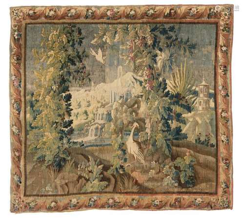 A 17thC Flemish verdure tapestry with exotic birds in a