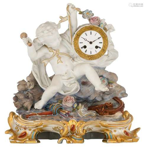 A polychrome decorated biscuit pendule of a putto