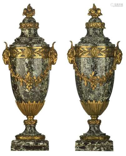 A pair of Neoclassical vert de mer marble castelettes