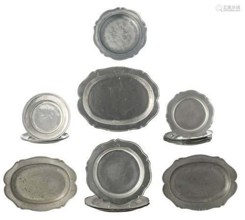 A large lot of oval pewter dishes, marked Bruges 'FD'