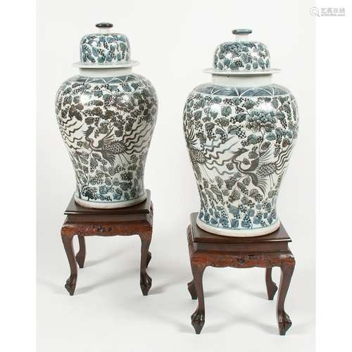 Pair of Monumental Lidded Jars with Phoenix Decoration