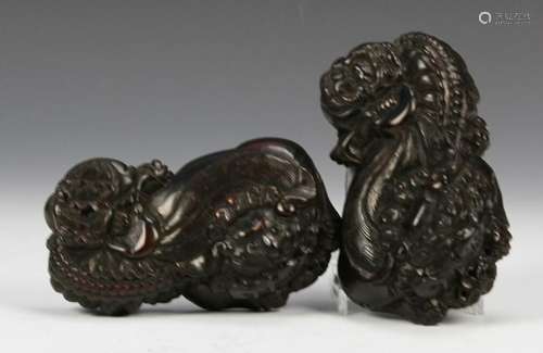 Pair of Chinese Carved Horn Foo Lions