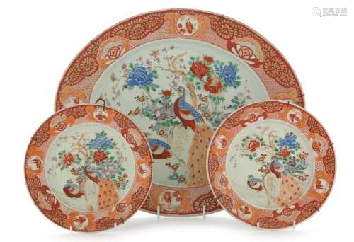 An Arita porcelain serving dish; and two plates.