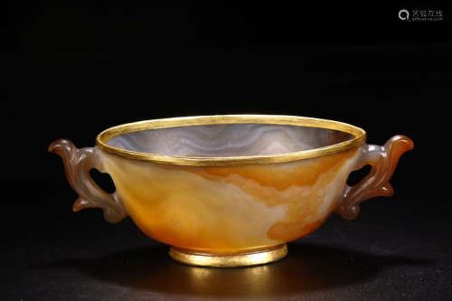 AN AMBER CUP
