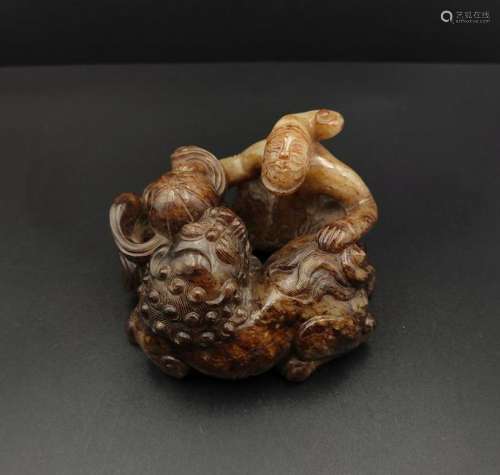 CHINESE WHITE JADE FOOLION WITH MAN