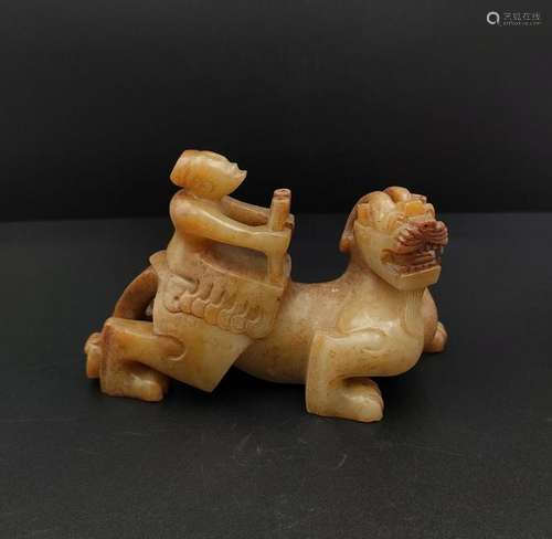 CHINESE ARCHAIC JADE BEAST WITH RIDER