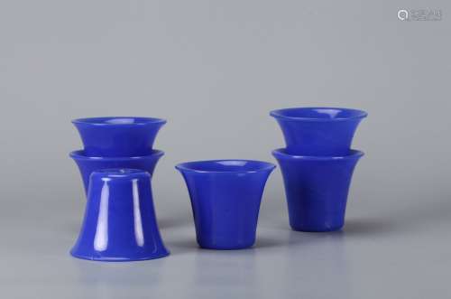 A Set of Chinese Carved Blue Peking Glass Cups