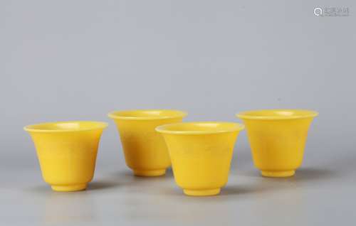 A Set of Chinese Carved Yellow Peking Glass Cups