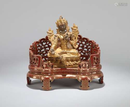 A Chinese Gilt Bronze Buddha with Porcelain Stand