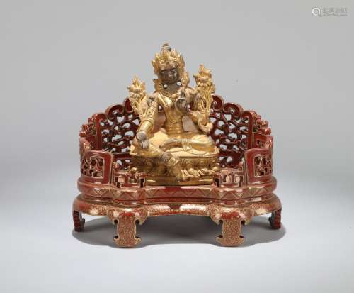 A Chinese Gilt Bronze Buddha with Porcelain Stand
