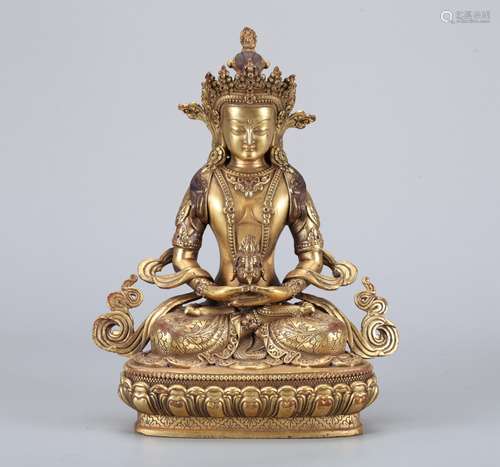 A Chinese Gilt Bronze Buddha