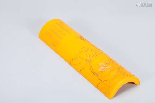 A Chinese Carved Yellow Peking Glass Arm Rest