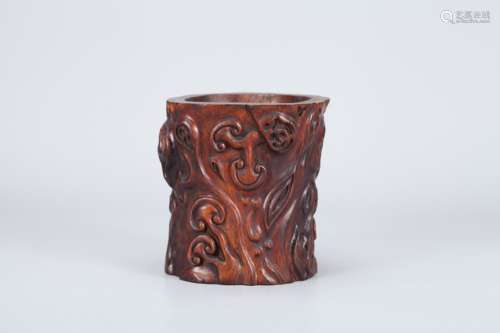 A Chinese Carved Agar-Wood Brush Pot