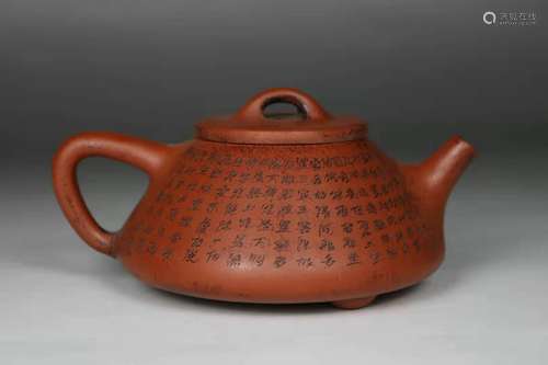 A Chinese Carved Yixing Clay Tea Pot