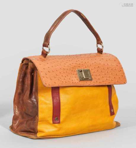 Vintage-HandtascheKunstleder in unterschiedlichen Brauntönen, Rot und Gelb. Weicher, rechteckiger