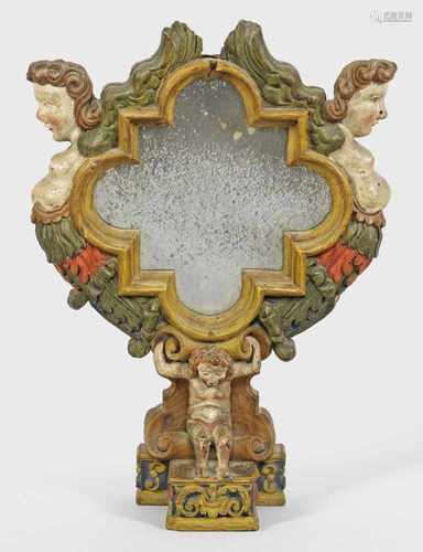 Barock-SpiegelaufsatzHolz, reliefplastisch geschnitzt und polychrom gefasst. Vierpassige,