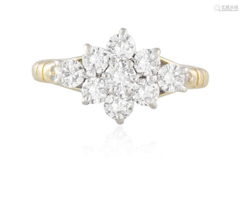 A DIAMOND CLUSTER RING, composed of round brilliant-cut diamonds weighing approximately 0.80ct