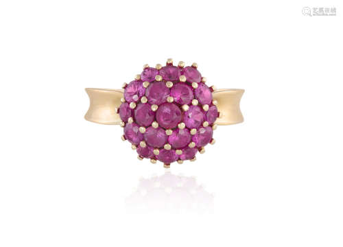 A RUBY DRESS RING, set with circular-cut rubies throughout, to a plain gold hoop, ring size Q