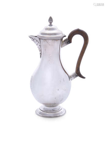 A GEORGIAN REVIVAL SILVER HOT WATER POT, London c.1904, of plain baluster form with walnut handle