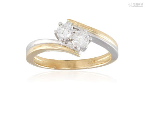 A DIAMOND DRESS RING, set with two brilliant-cut diamonds to a plain bi-coloured 18K gold hoop, ring