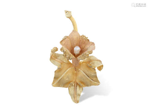 A GOLD BROOCH, designed as a flower with polished and textured gold petals, mounted in gold,