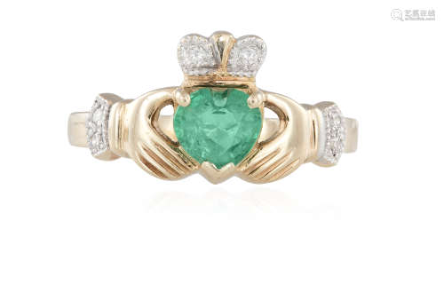 A CLADDAGH RING, composed of a heart-shaped emerald highlighted with single-cut diamonds, mounted in