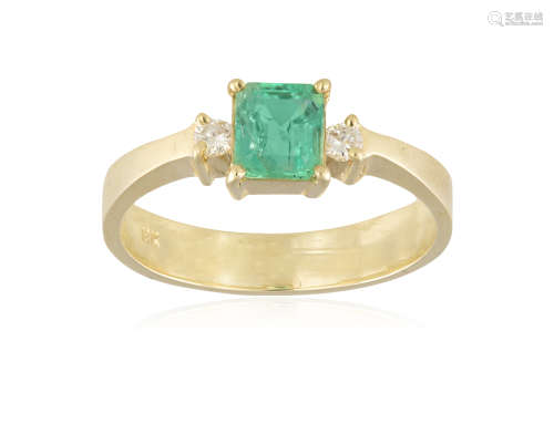 AN EMERALD AND DIAMOND RING, the central square step-cut emerald between two round brilliant-cut